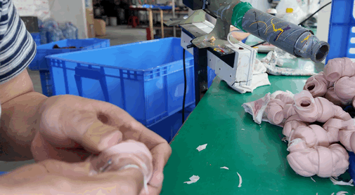 trimmed the excess material from the joint areas of the mold manually