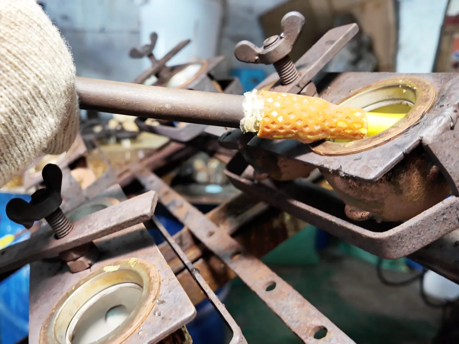 Use an injection gun to inject yellow PVC material into the vinyl molds.