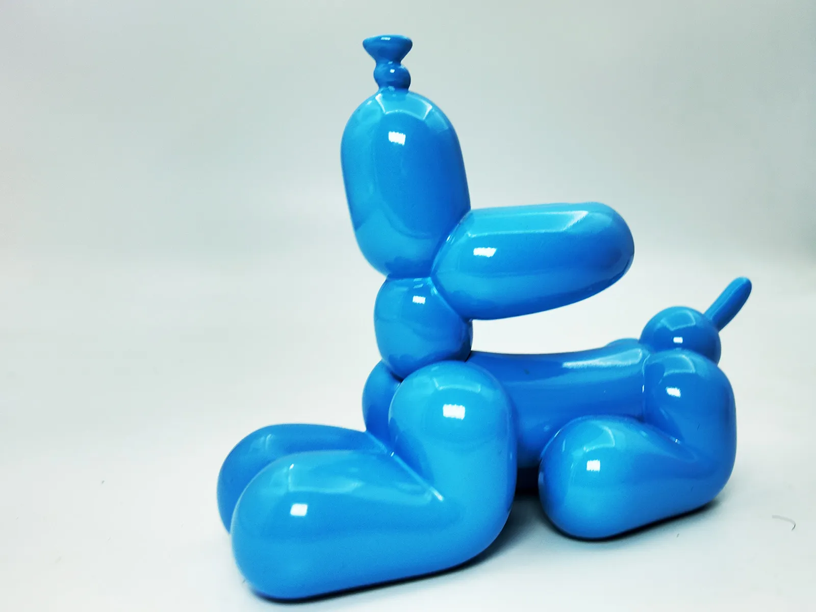 Balloon Dog Art Toy sample, made of solid glossy PVC material with a plump blue inflated body.