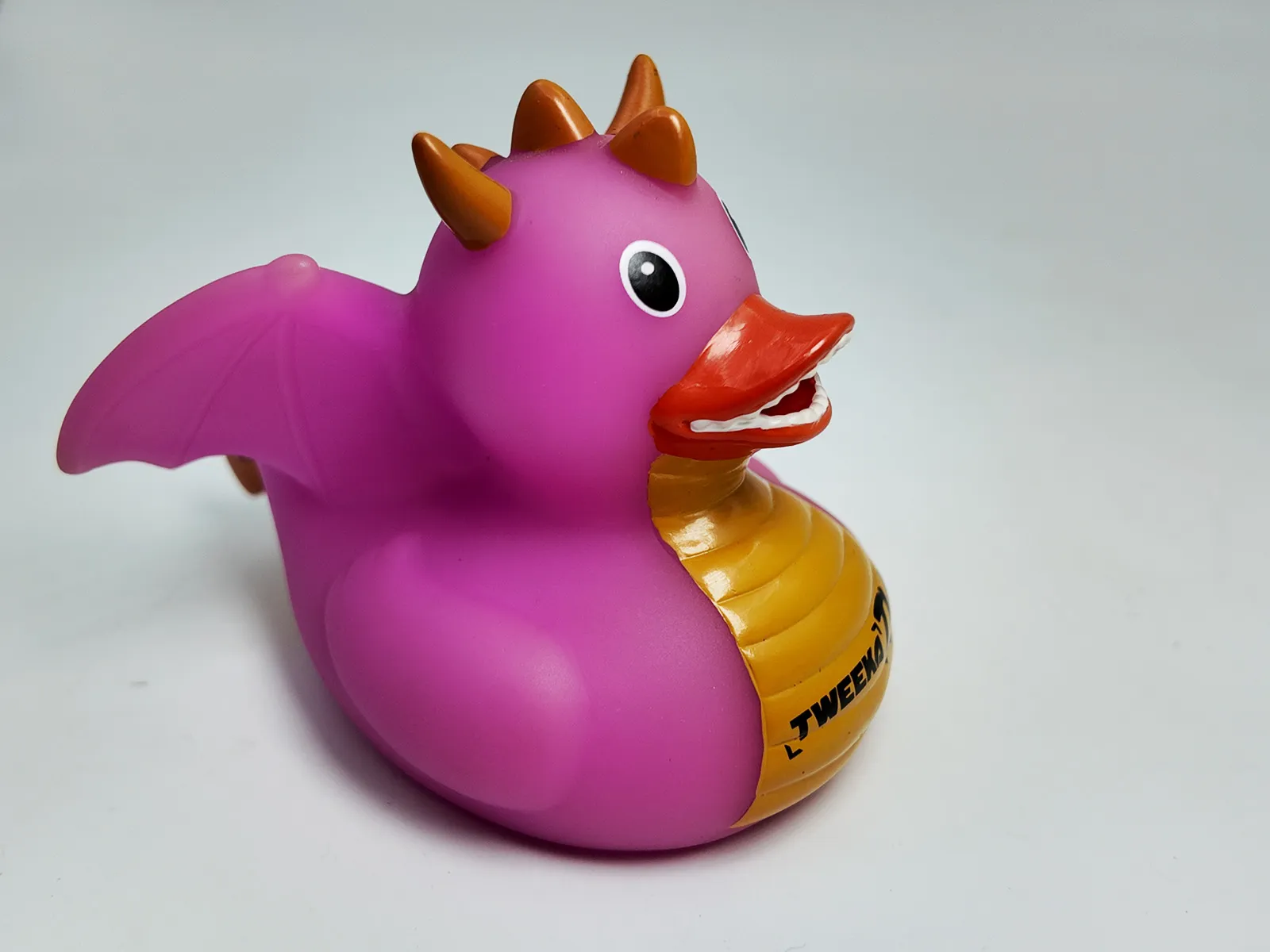 Duckling-shaped vinyl toy.
