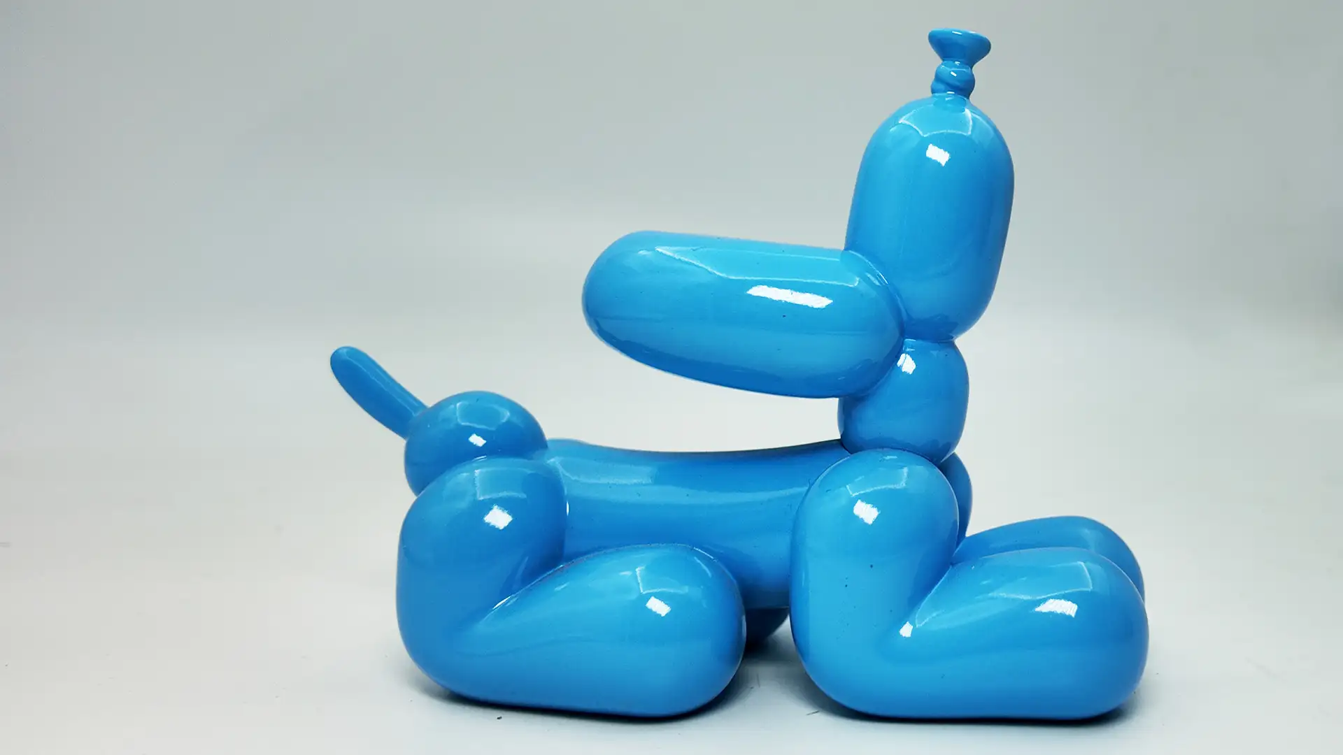 The PVC injection molded balloon dog toy features a substantial, weighty feel