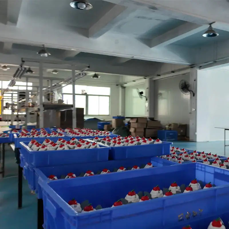 A large batch of toys is being air-dried, awaiting packaging